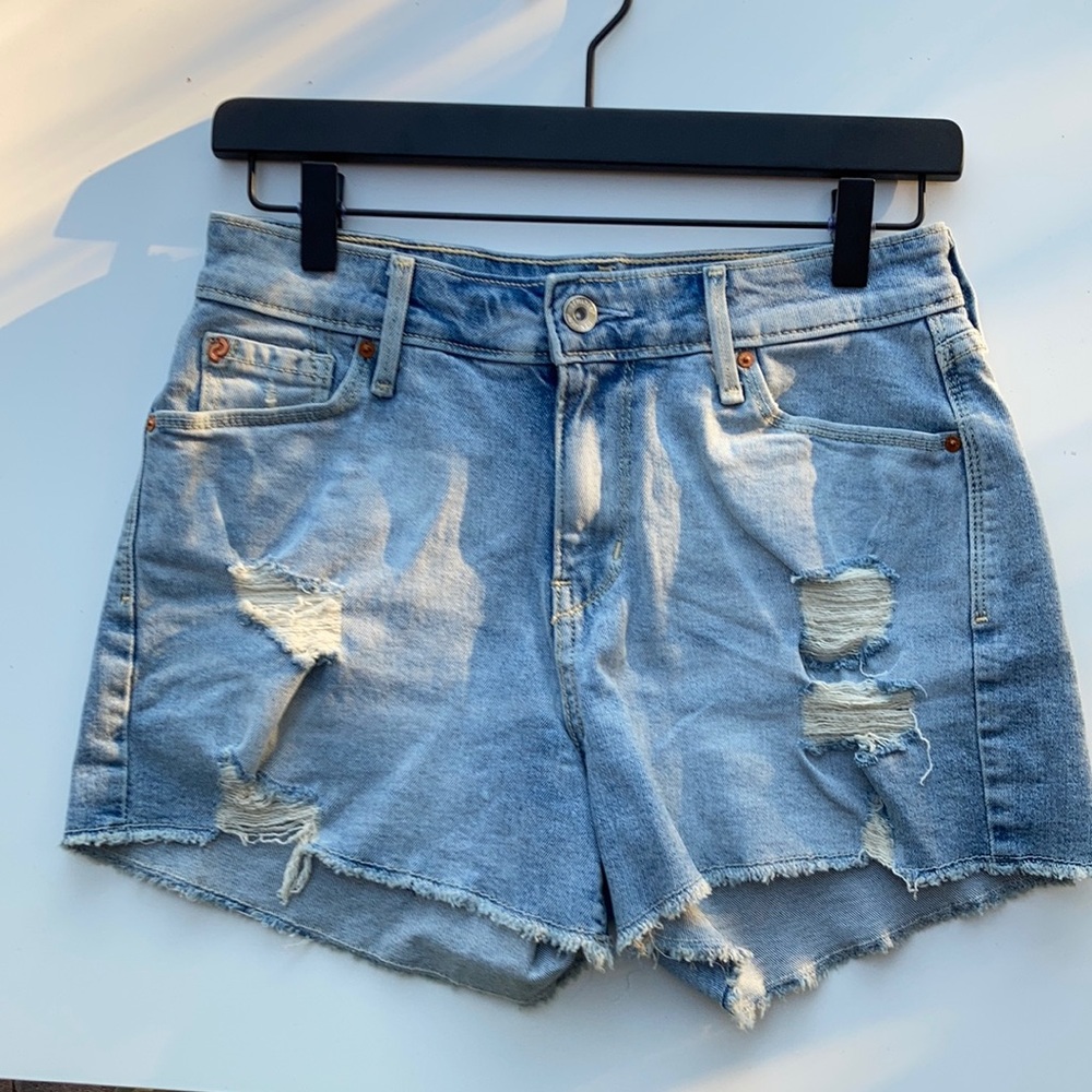 Denizen from Levi’s high-rise shorts.